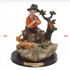 NIÑO CON VENADO