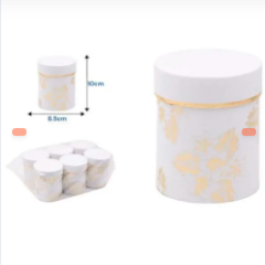 CAJA DE REGALO CIRCULAR BLANCA CON HOJAS DORADAS